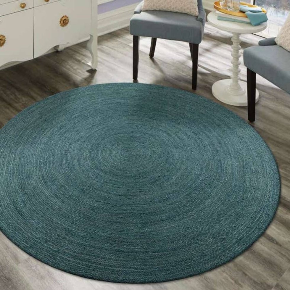 Tealgrön flätad rund jute matta
