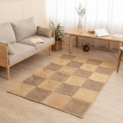 Braided checkerboard jute rug