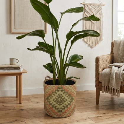 Tribal jute kilim basket for plant